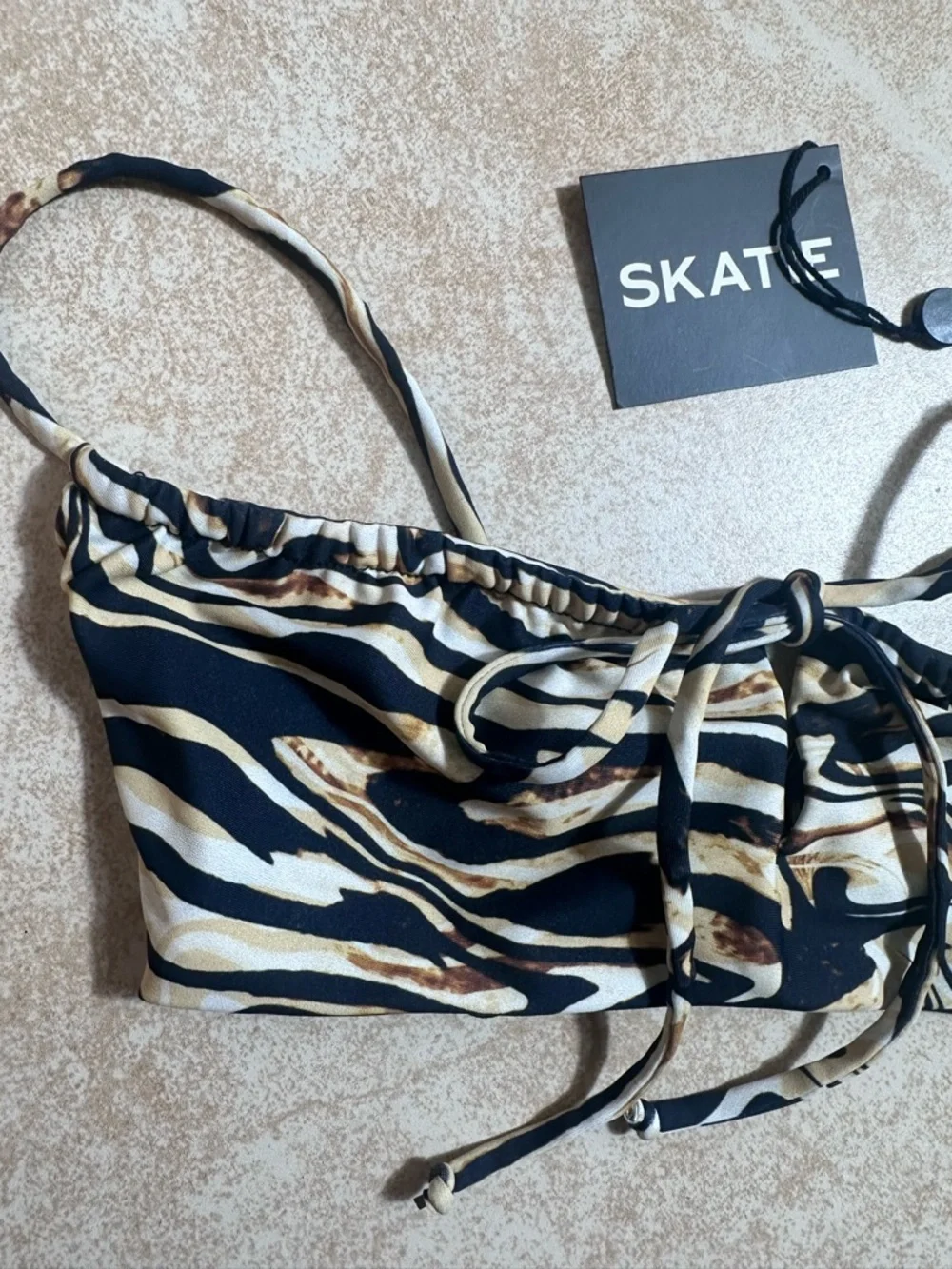 Skatie Swirl-Print Bikini Top in Black, Cream, and Brown